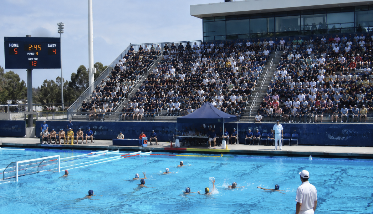 Water polo match with packed stadium crowd
